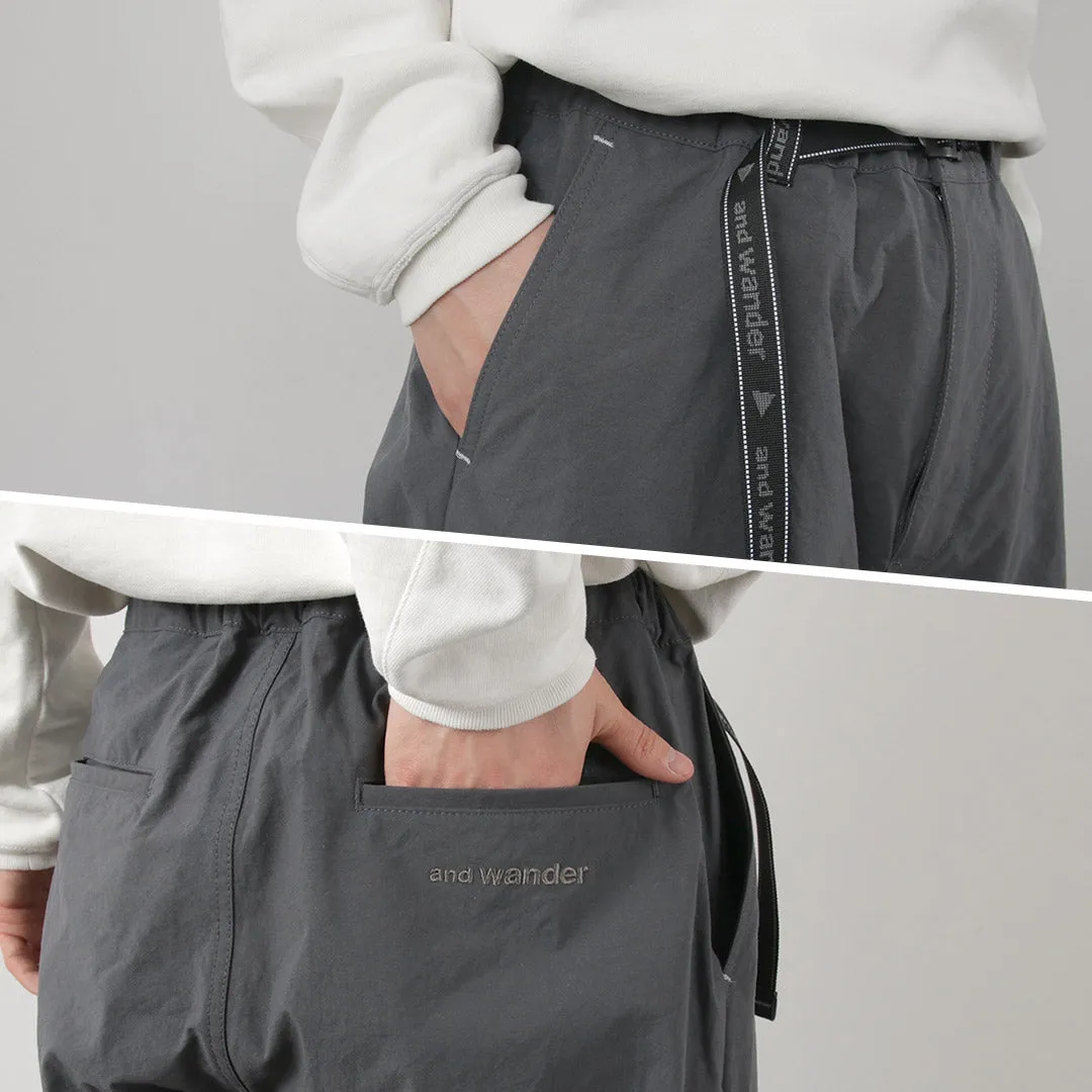 AND WANDER / Nylon Chino Tucked Tapered Pants