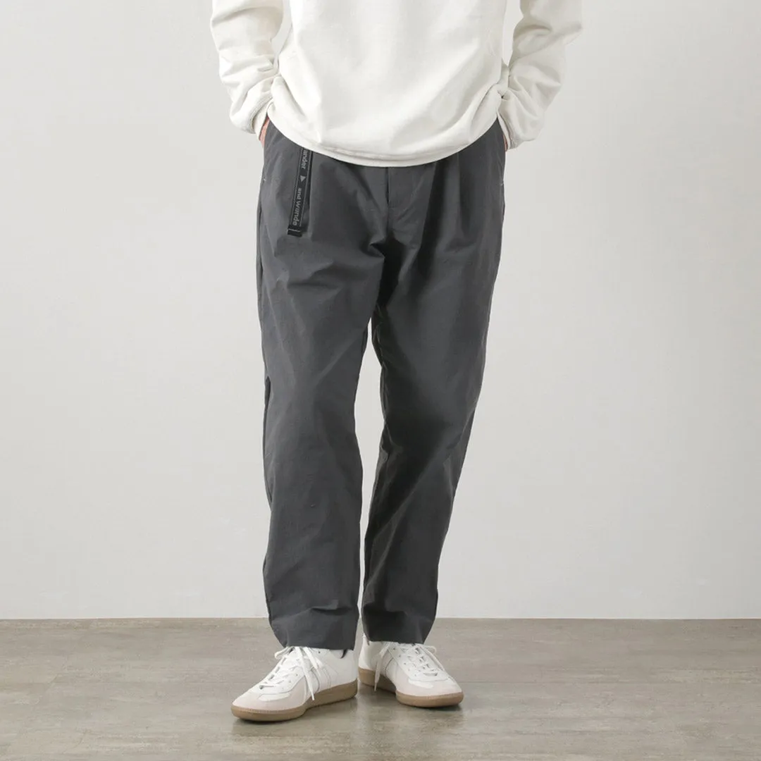 AND WANDER / Nylon Chino Tucked Tapered Pants