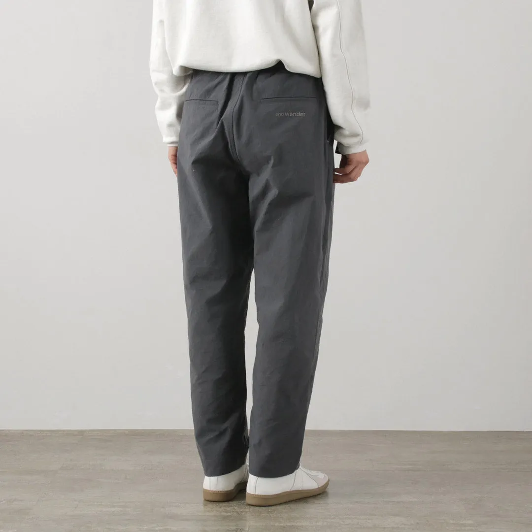 AND WANDER / Nylon Chino Tucked Tapered Pants