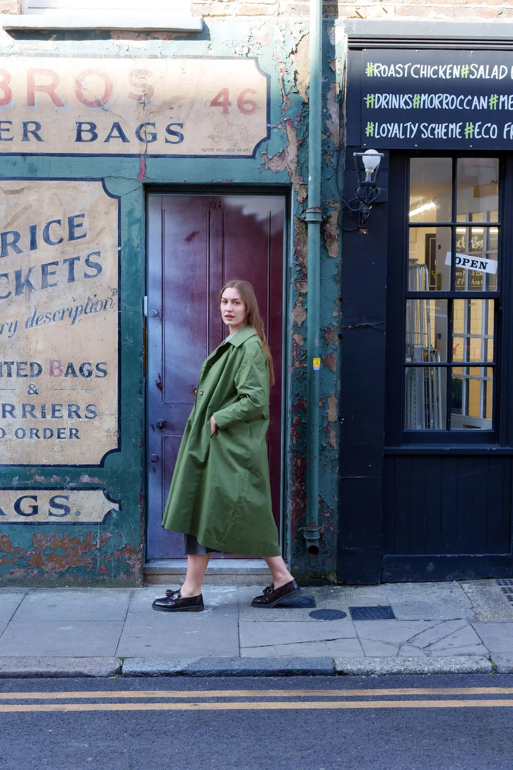 Waxed Cotton Asymmetric Raincoat in Olive by Lora Gene