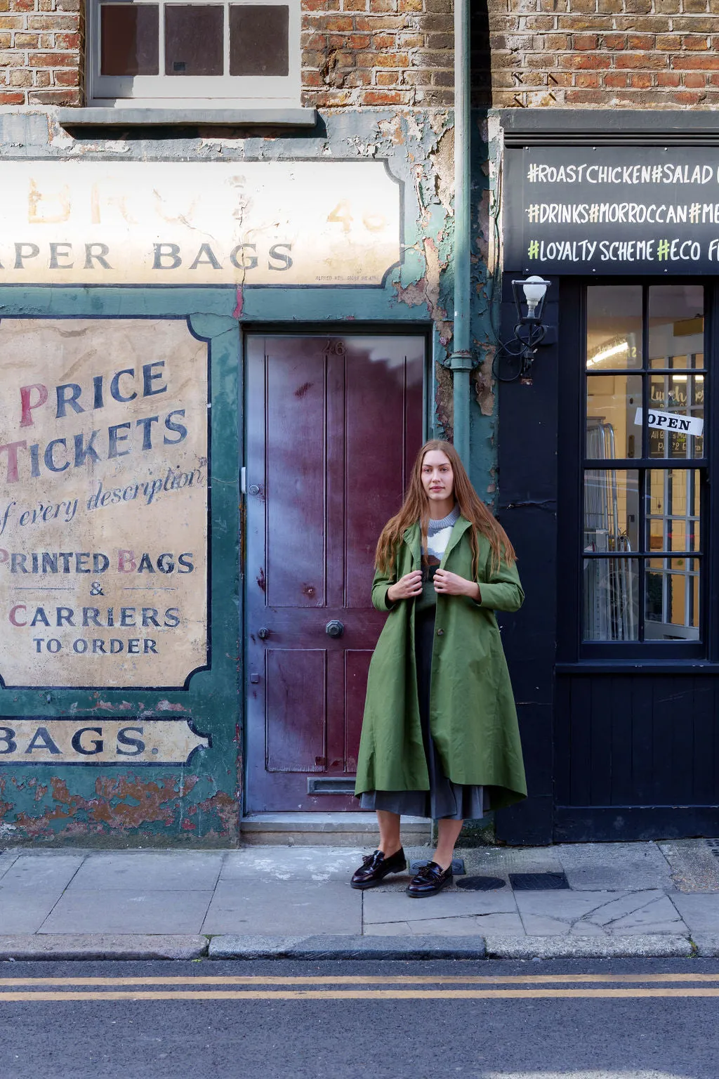 Waxed Cotton Asymmetric Raincoat in Olive by Lora Gene