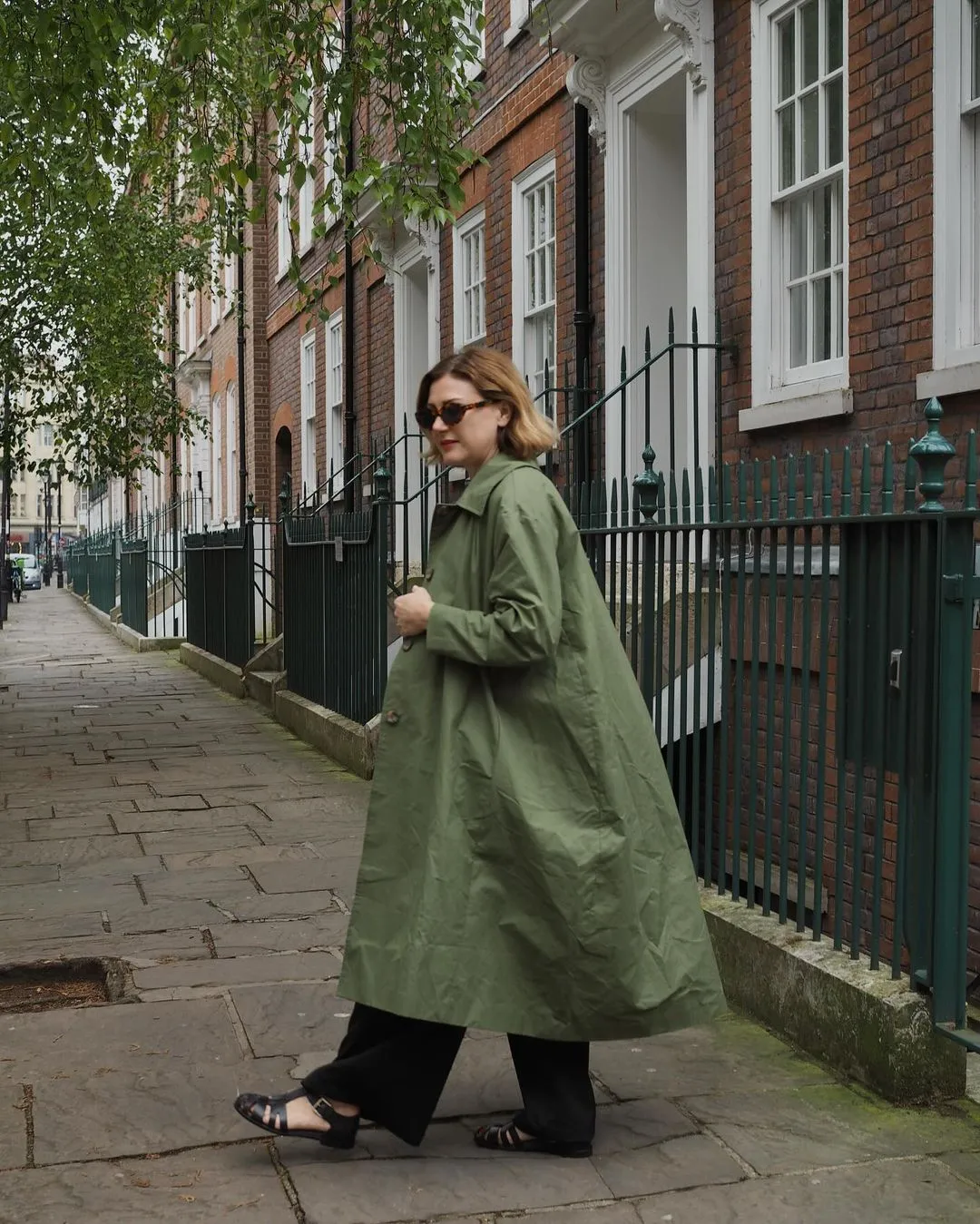 Waxed Cotton Asymmetric Raincoat in Olive by Lora Gene