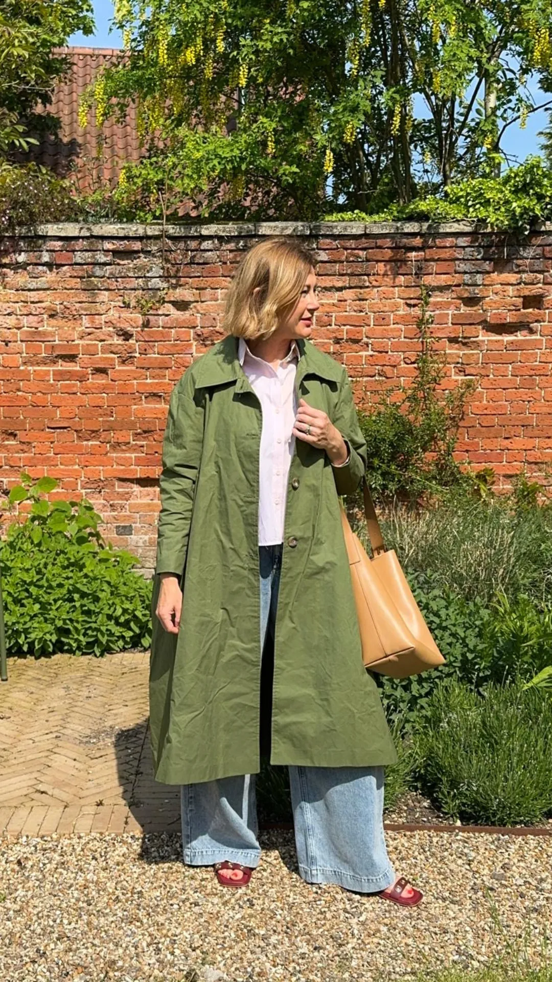 Waxed Cotton Asymmetric Raincoat in Olive by Lora Gene